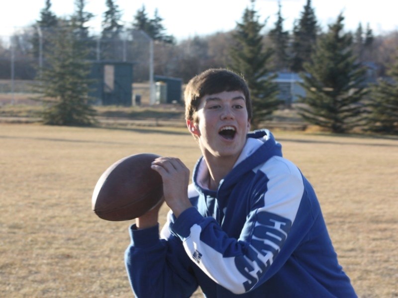 Michael Pieroway looks for his man downfield during the Athabasca Pacers game of touch football last Thursday.