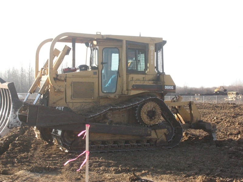 A student works in a bulldozer during the practical portion of Portage College&#8217;s heavy equipment operator program. Last year, the college ran a pilot program for the