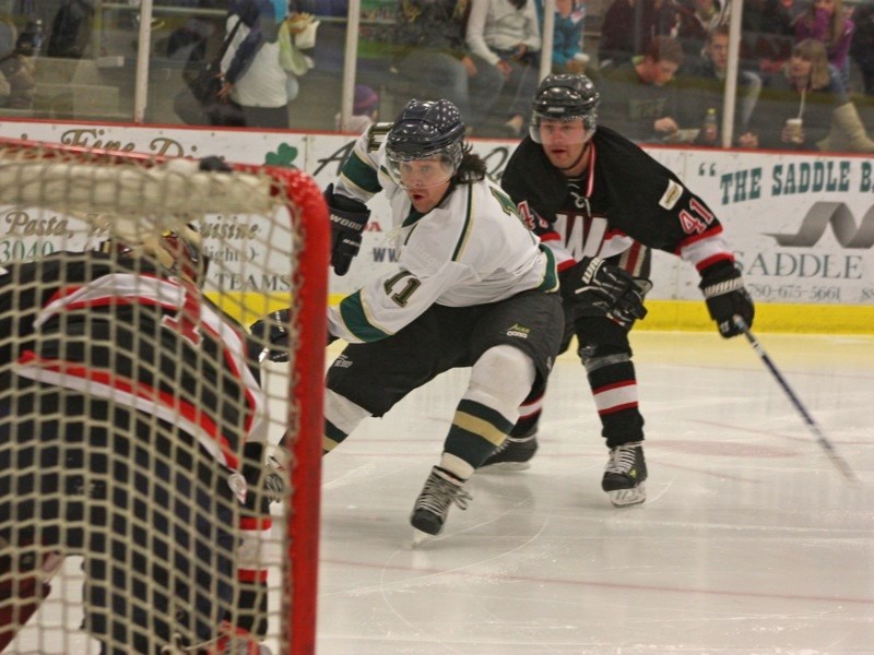 The Athabasca Aces lost a hard fought game to the Slave Lake Winterhawks by a score of 7-3 at the Athabasca Regional Multiplex on Friday, Nov. 4. Sean Wrusch bears down on
