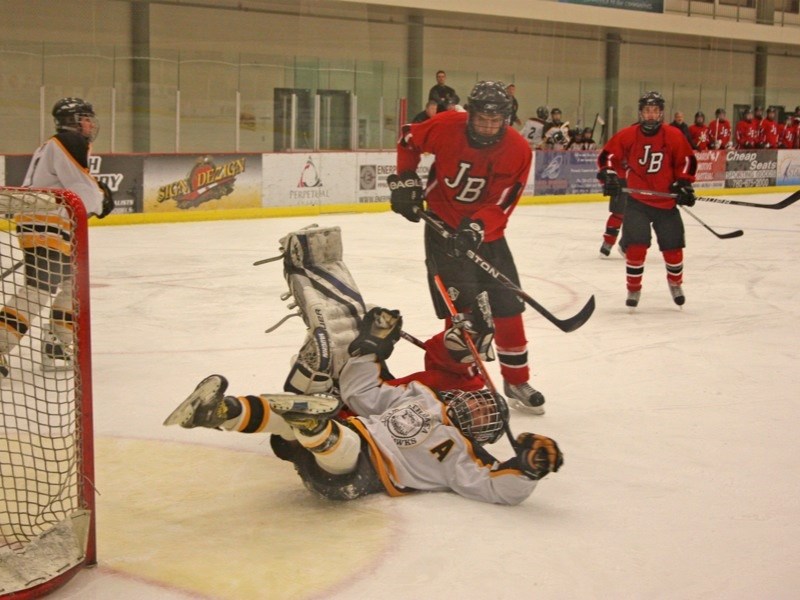 The Athabasca Midget &#8216;A&#8217; Hawks are still undefeated after beating Jasper twice in a pair of home games last weekend. Marc Terrien topples over the Jasper