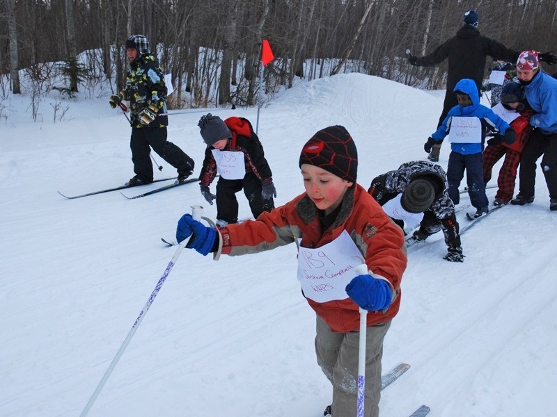 Local skiers hit the trails at Landing Trail Intermediate School for the Aspen View Regional Cross Country Ski Championships last Thursday. First grader Joshua Campbell stays 
