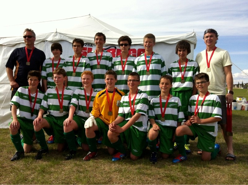 Athabasca&#8217;s U14 Celtic boys soccer team won gold at the Slurpee Cup on the first weekend of June. (back row, l-r) coach Greg Elgert, Nathan Minkus, Jakob Finney, Max