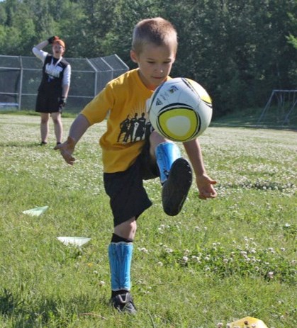 Athletes In Action brought their soccer camp back to Athabasca last week. Dakota Copp keeps the ball in the air.