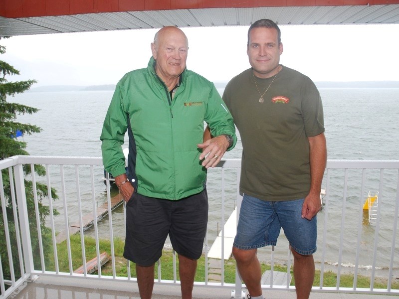 Oliver Kondratiuk (left) shows off his two wedding bands, one &#8220;newer &#8221; and one lost 35 years ago that was found by his nephew Rick Yost. Rick found the ring after 