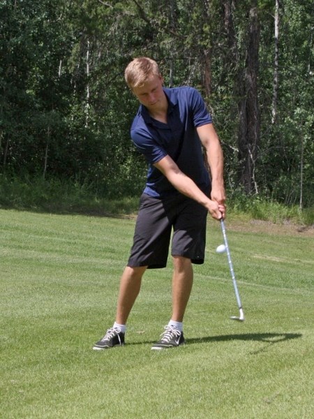Local golfers hit the links for the Koch Ford Men&#8217;s Open at the Athabasca Golf Club last weekend. Gavin Lux chips to the green.