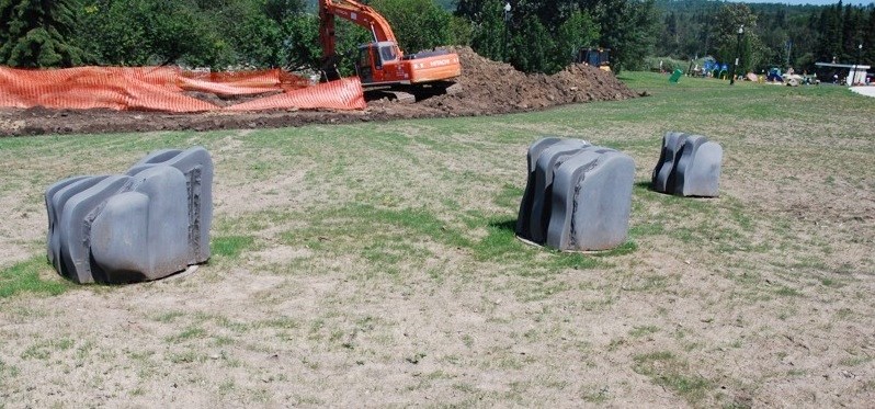 Sculptures recently placed at the riverfront in recognition of the town&#8217;s centennial have been met with criticism by some members of the community.