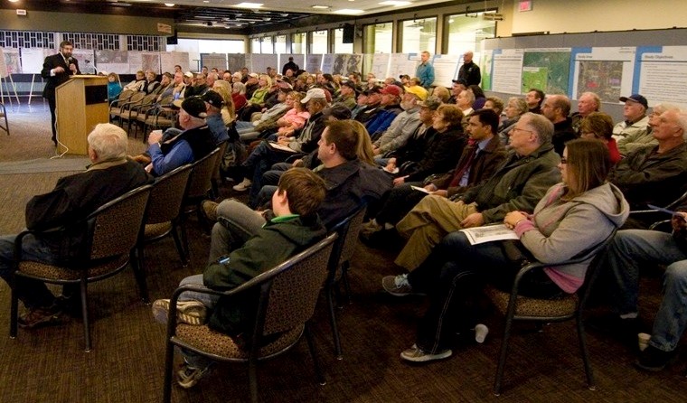 Arthur Gordon of CastleGlenn Consultants Inc. (left) speaks to community members at the Athabasca Regional Multiplex during the truck bypass consultation last Thursday.