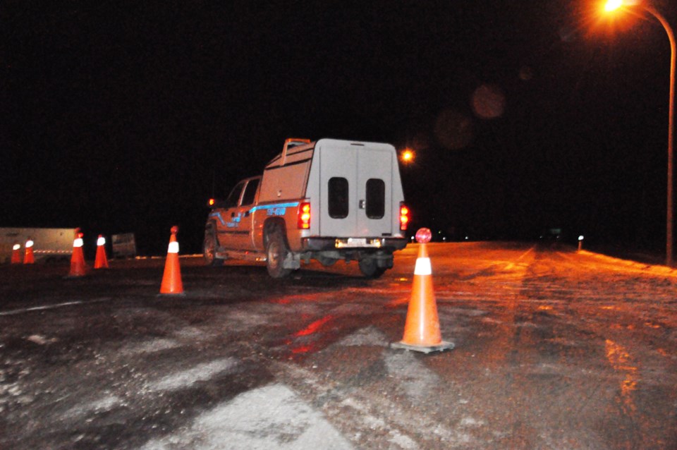 Highway 63 was blocked off by T.E. Flagging Services at Highway 55 and detoured for a few hours Wednesday night as cleanup crews and investigators tried to piece together