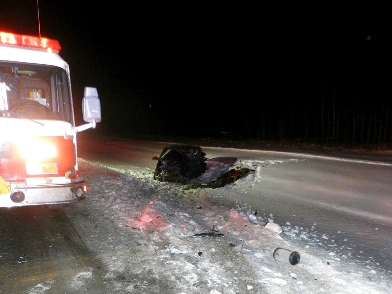 The remnants of an SUV lie motionless in the ditch on Highway 63 following a fatal crash last Wednesday night.