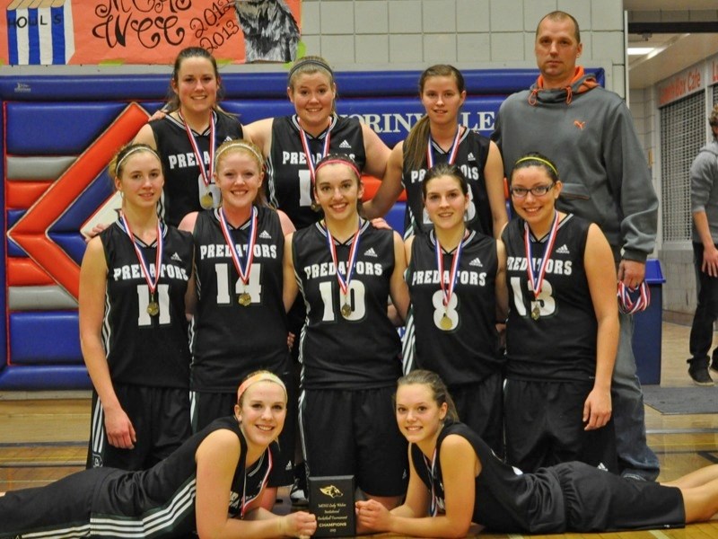 EPC&#8217;s senior girls basketball team won gold in Morinville on the weekend. (back row, l-r) Amy Zacharuk, Kayla Breitkreutz, Amber Chrunyk, coach Wade Hicks. (middle row, 