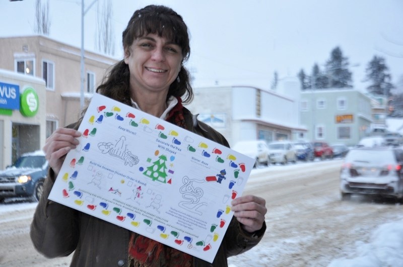 Pat Pedersen, coordinator of the Athabasca Early Child Development Coalition, shows off one of the placemats she produced as a project backed by the Athabasca-based coaltion. 