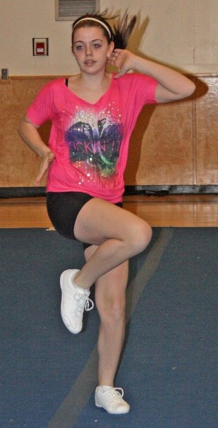 EPC cheerleader Bailey Jewell practices last week.
