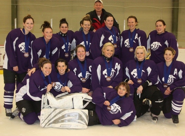The Athabasca Purple Panthers hosted the Senior B Women&#8217;s Hockey Provincials last weekend and won silver. The team shows off their medals. (top row, l-r) Jaime Minns,