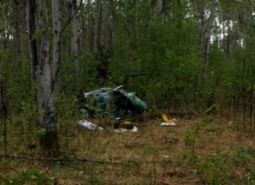 An Athabasca biologist and the pilot was killed after this helicopter crashed north of Fort McMurray.