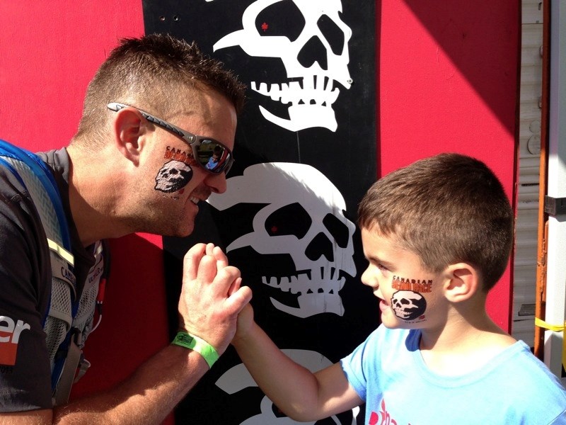 Marty Mudryk ran the North Face Canadian Death Race Aug. 3 and accompanied his son and wife in the kids&#8217; race the following day. (l-r) Marty Mudryk and his son Teegan