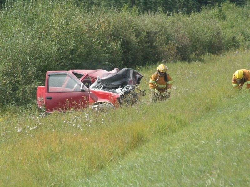 Two Athabasca County residents were injured in a collision between a fuel truck and a red pickup.