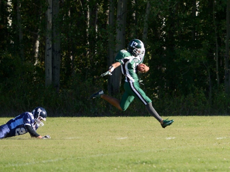 Pacers quarterback Gaetano Minto evades a Vortex player last Friday.