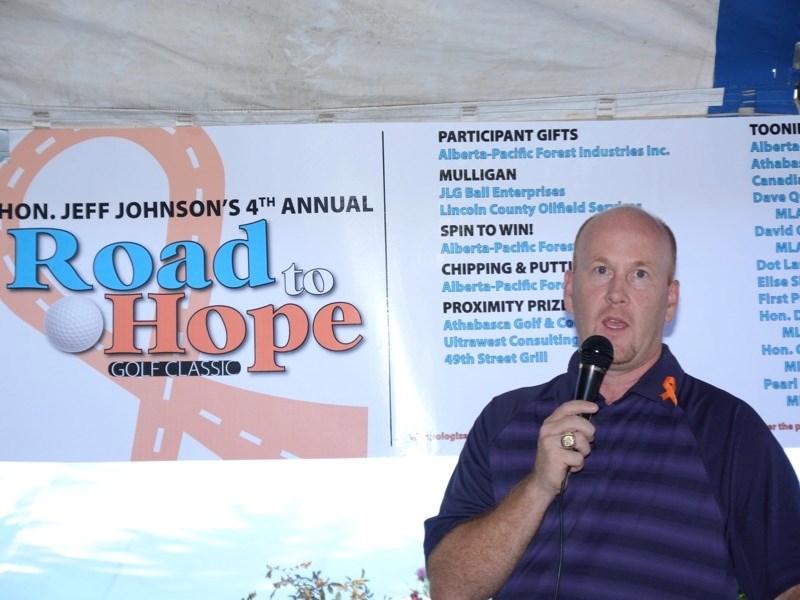 Athabasca-Sturgeon-Redwater MLA Jeff Johnson speaks to golfers at a post-tournament barbecue.