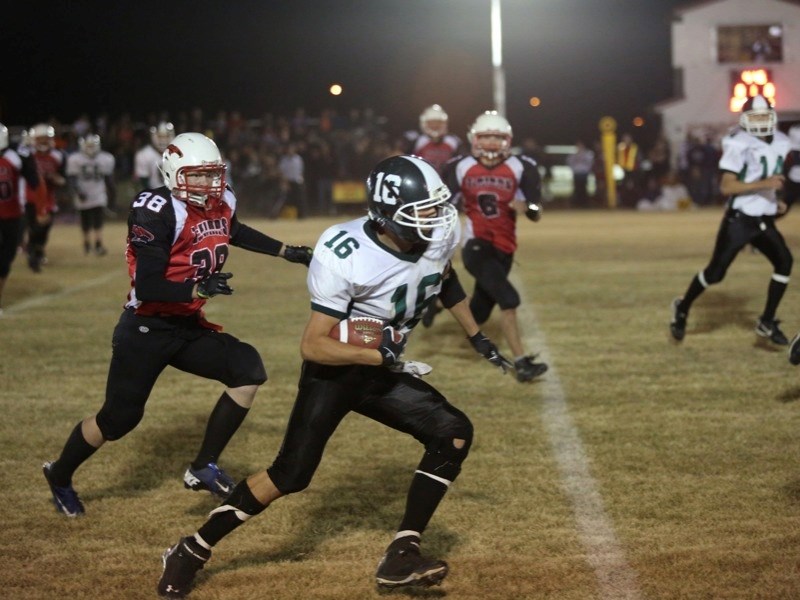 Pacer Mike Pieroway outruns Westlock Thunderbirds at last Friday&#8217;s game, which the Pacers won 48-34, putting them in first place in the Wheatland Football League.