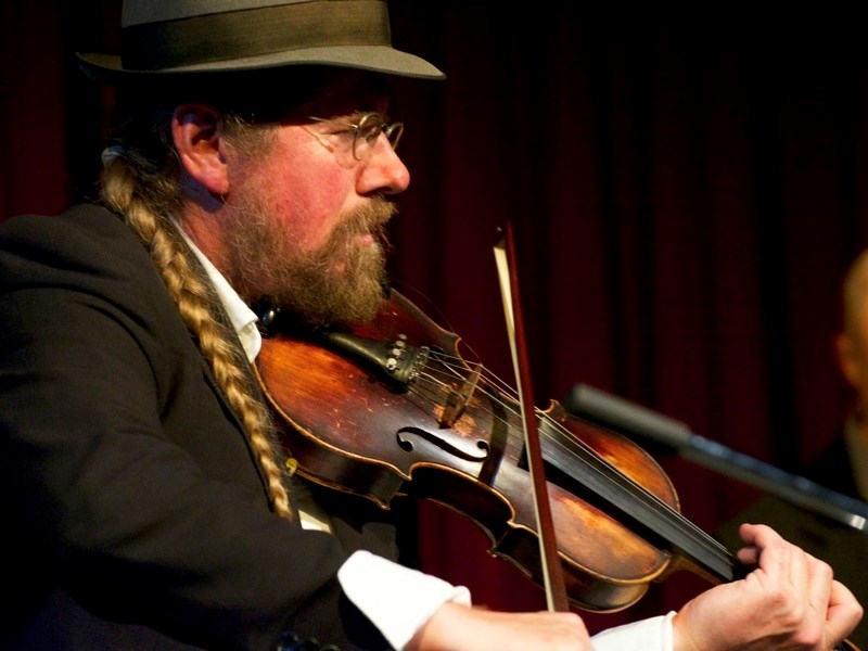 Group lead Cam Neufeld played violin, ravanhatta and morchang throughout the night.