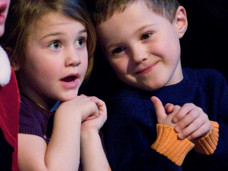 (l-r) Myah Schweer and Owen Ings danced and sang along during &#8220;Joy To The World” at a Spiritus Singers performance last year. This year, the choir will give four