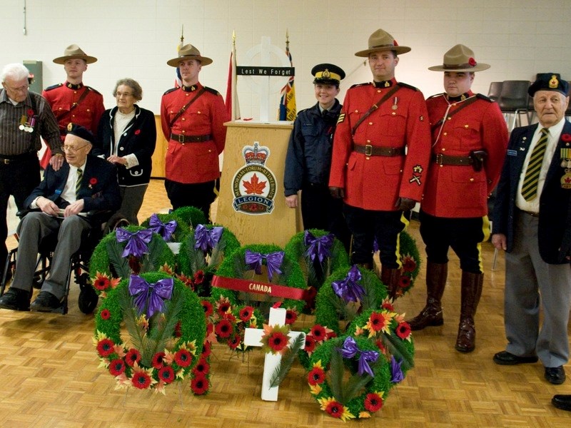 Boyle-area veterans, Legion members and RCMP officers posed with the wreath-laden cenotaph following last year&#8217;s Remembrance Day ceremonies.