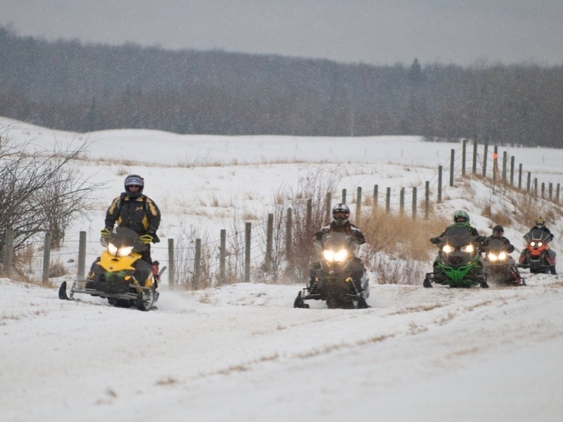 The Athabasca River Runners Snowmobile Club (pictured at last year&#8217;s poker rally) is hosting the 2014 Alberta Snowmobile Association jamboree in February.