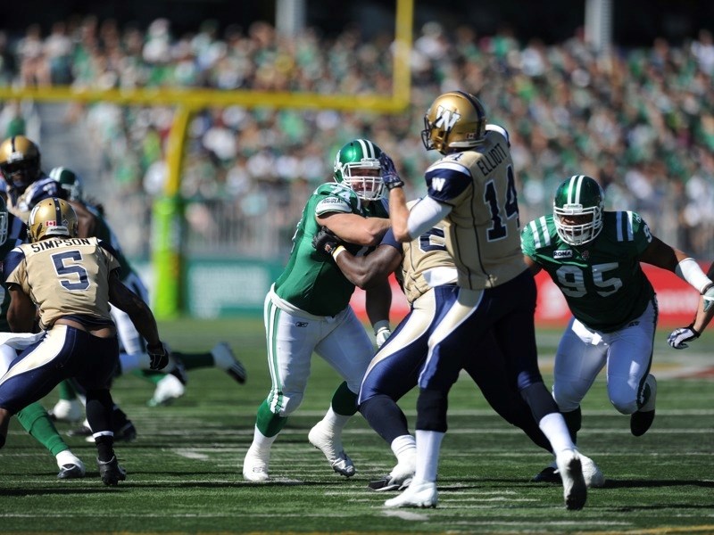 Defensive tackle Keith Shologan hustles during the Roughriders&#8217; pre-season home game against Edmonton on July 8. The Riders went on to win the Grey Cup last month; on
