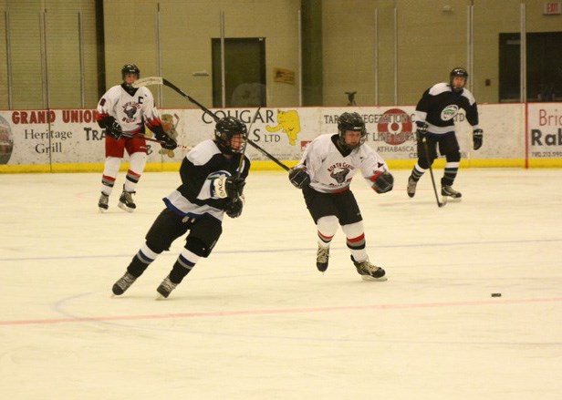 Hinton received a mixed welcome at the Athabasca Regional Multiplex this weekend. The Athabasca midget B2 hockey team suffered an 8-5 loss to the Hinton midget B team last