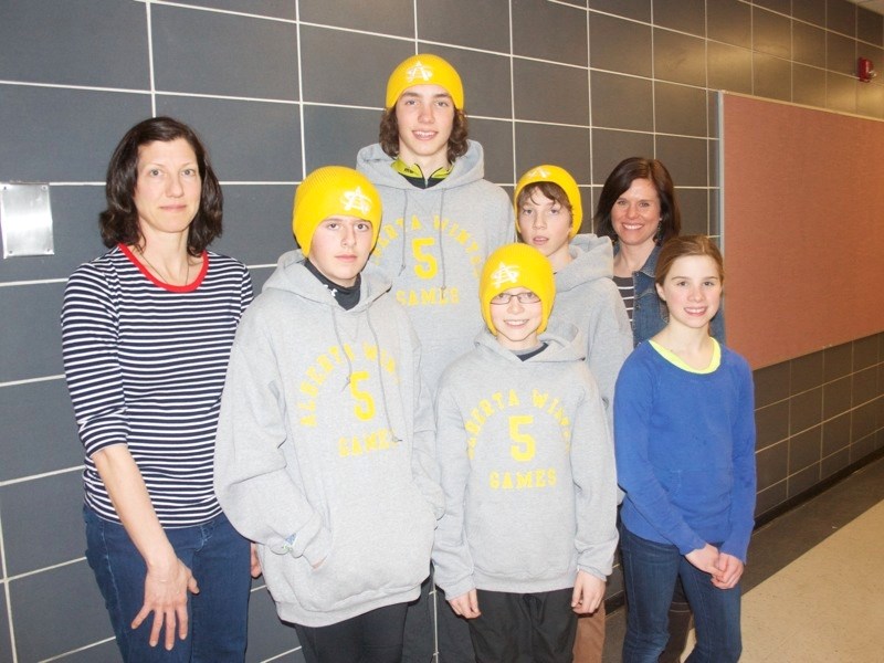 Representing Zone 5 in cross-country skiing at the Alberta Winter Games are (back row, l-r) coach Colleen Elgert, Max Elgert, Sam Elgert, coach Jennifer Jones, (front row,