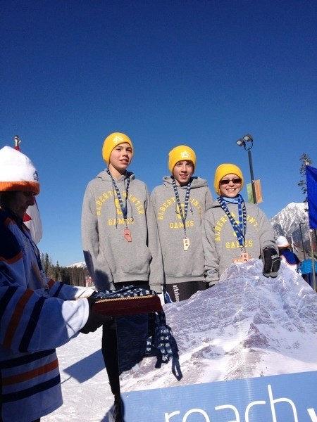 Athabasca Nordic Ski Club members brought home many medals from the Alberta Winter Games. Two Athabascans were on the bronze medal-winning midget boys relay team. (l-r) Relay 