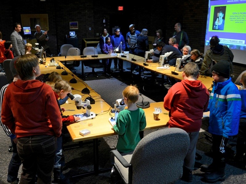 Science Outreach-Athabasca allowed children and adults alike to enter the world of microscopy last Thursday by setting up microscopes through which people could examine bits