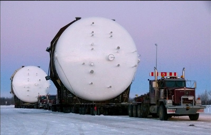 The super wide load is an inclined plate separator and is used in oilsands operations.