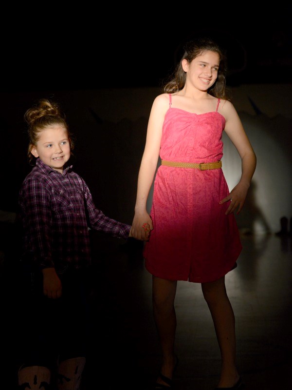 (l-r) Maizie Holdis and Amy Dufault strut their stuff at the first Grassland Hair Show. Grassland School&#8217;s cosmetology class held the show last Monday at the school.