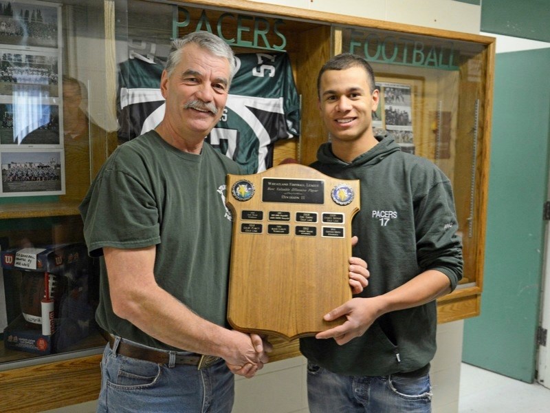 Former EPC Pacers quarterback Gaetano Minto (right) had a stellar final season with the team in 2013 and won Most Valuable Offensive Player in the Wheatland Football
