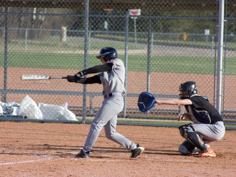 Athabasca midget AA Trappers player Nate Day swings at a pitch during a game against Barrhead on May 21. The Barrhead Orioles won 6-5.