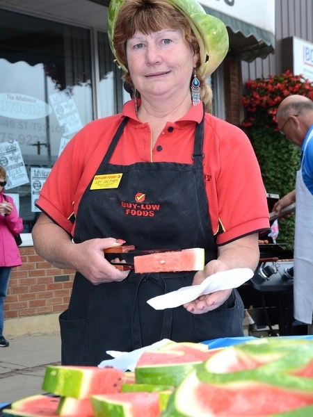 Judy Gauthier of Buy-Low Foods is a fixture at the 49th Street Bash.