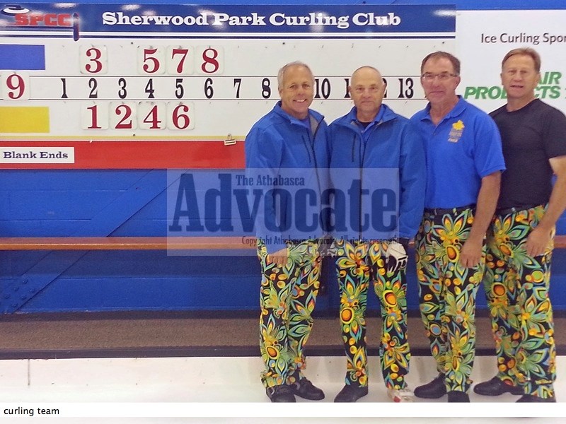From left: Skip Rob Balay, third Vic Shapka, second Tony Kiselyk and lead Bernie Giacobbo pose for a photo following the gold medal final on Saturday.