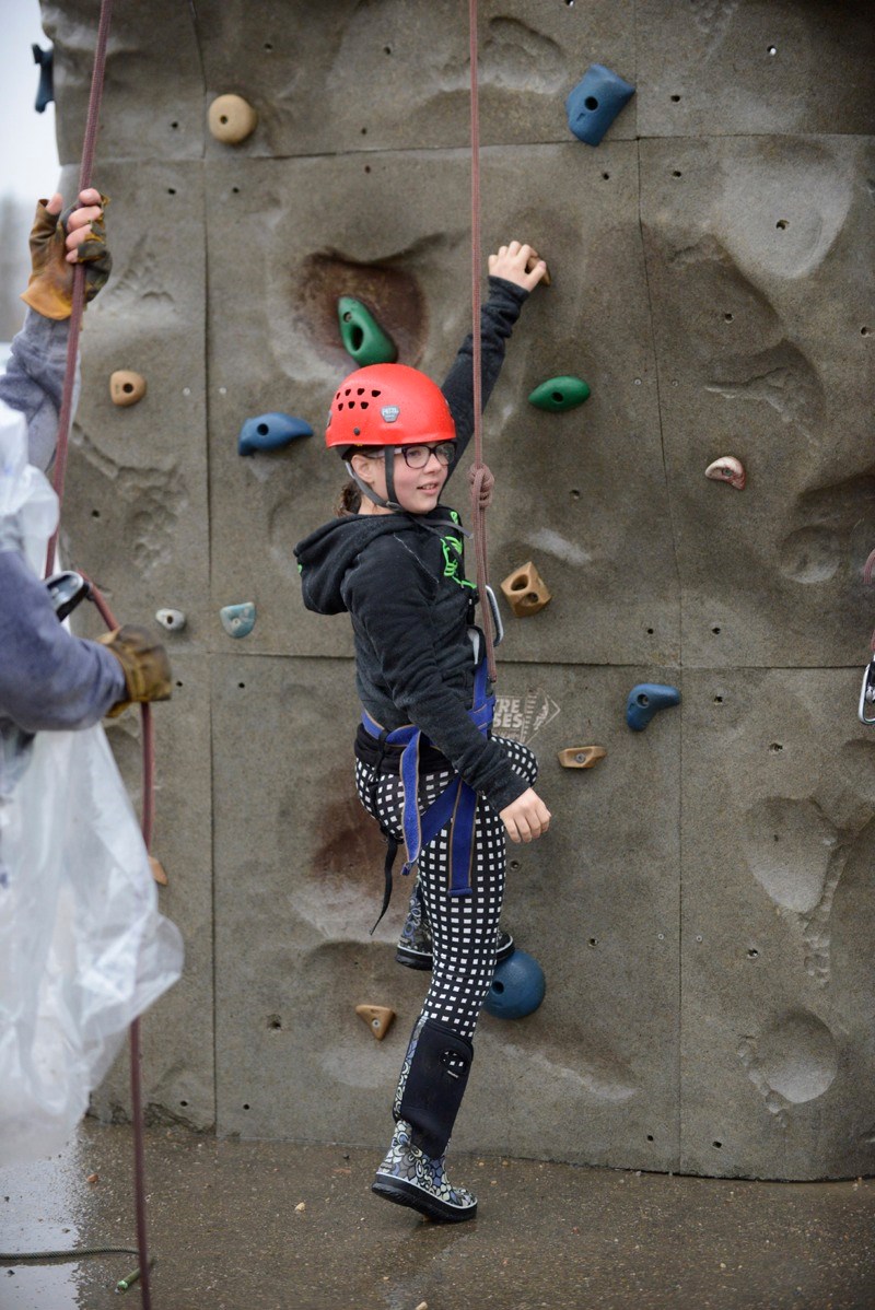 Sarah Gabourie gets ready to take on the climbing wall last Friday at Landing Trail Intermediate School&#8217;s annual Flying High event. The day let students in Grades 4 to
