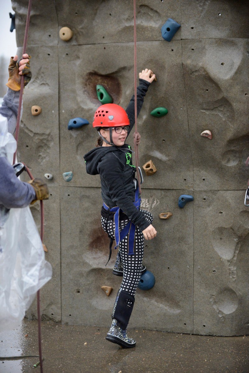 Sarah Gabourie gets ready to take on the climbing wall last Friday at Landing Trail Intermediate School&#8217;s annual Flying High event. The day let students in Grades 4 to