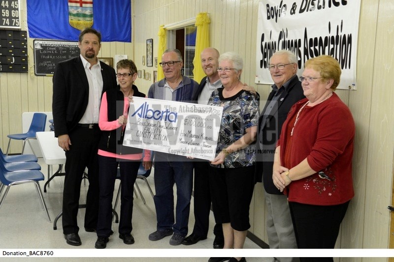 (l-r) MP David Yurdiga, Seniors Centre member Claudette Cornan, Seniors Centre President Rob Bourassa, MLA and Seniors minister Jeff Johnson, Boyle resident Val Sinclair,