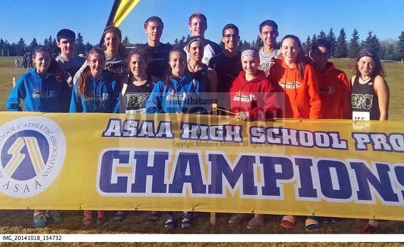 The EPC cross country running team stand behind a banner at the provincials in Okotoks. They are (back, l-r) Mitch Lovelace, Sarah Meyer, Can Hutchinson, Ben Michelson, Alex
