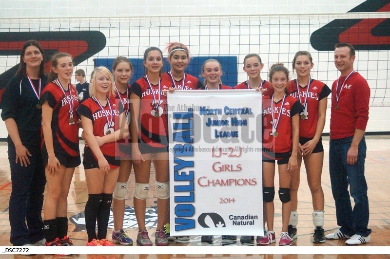 (l-r) The Boyle Huskies junior girls A team standing with their championship banner are coach Sheri Bencharsky, Kady Graham, Meeka Gervais-Gillam, Zowie Shapka, Denise