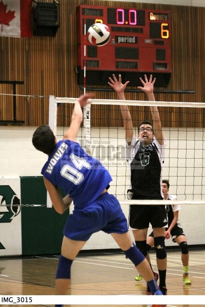 Edwin Parr Composite&#8217;s Evan Kaminski (6) goes up in an attempt to block this smash from Morinville&#8217;s Brandon Dubrule during their opening match of the tournament