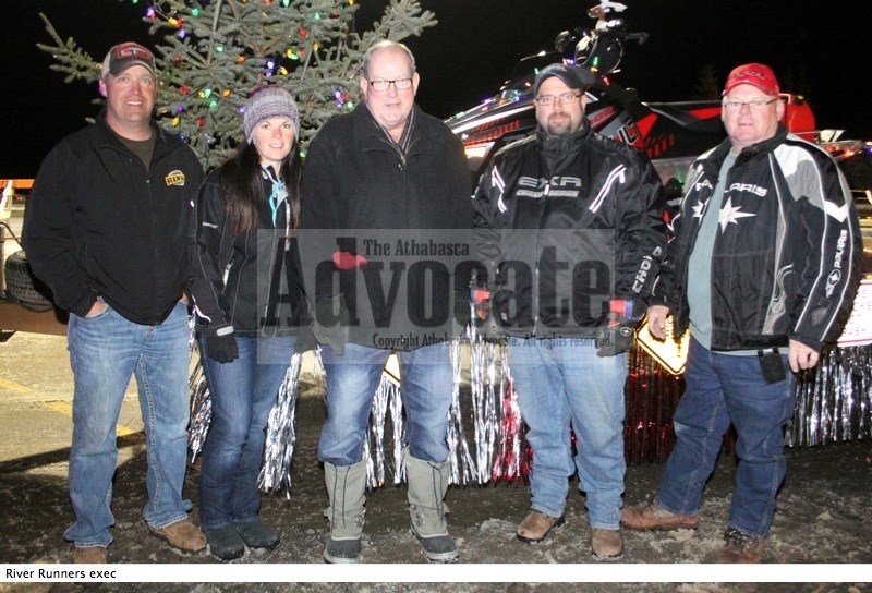 The recently elected executive of the Athabasca River Runners Snowmobile Club are (l-r) Jim Olson &#8211; vice president, Lynn Olson &#8211; treasurer, Dennis Irving &#8211;