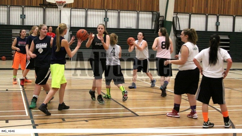 The EPC senior girls basketball squad goes through part of their warm up routine during practice last week as they prepared to open their season this past weekend at a
