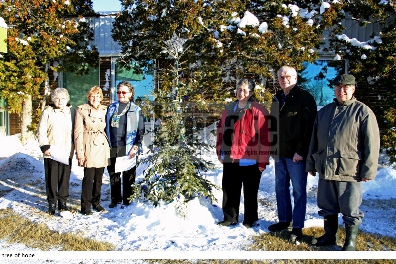 (l-r) Members of the Boyle Ukrainian Catholic Church Anna Zayezierski, Elsie Harrynuck, Sandi Kuzyk, Irene Luchka, Albert, Luchka and Roy Kozak get the honour of lighting the 