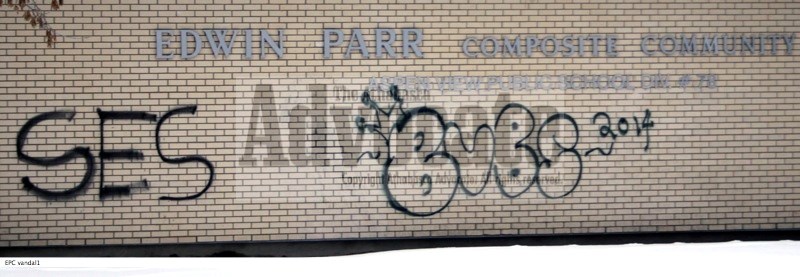 The school and a van were hit with spray paint, which included some explicit and very offensive words and images.