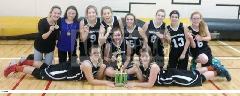 The Predators pose with their first place trophy in Hinton. Pictured are (back, l-r) coach Suzanne Beckett, Dayle Gill, Ayden Burger, Taylor Pente, Josie Elgert, Shae