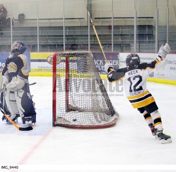 Athabasca Storm Hawks&#8217; Taycen Heck celebrates a first period goal versus Wabamun at the Multiplex on Saturday in their first game of the series.
